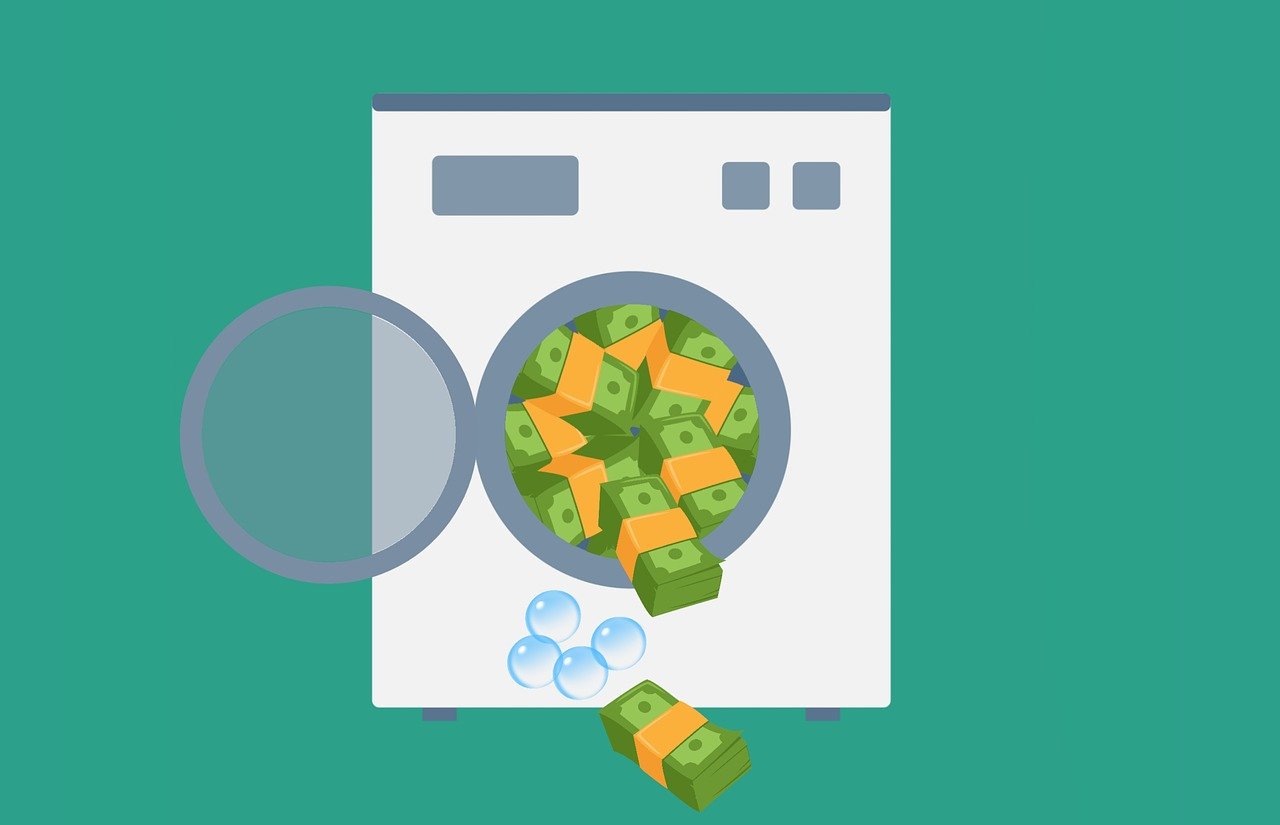 Engagement washing is illustrated with a money laundering wash maschine with a picture from mohamed hassan from pixabay